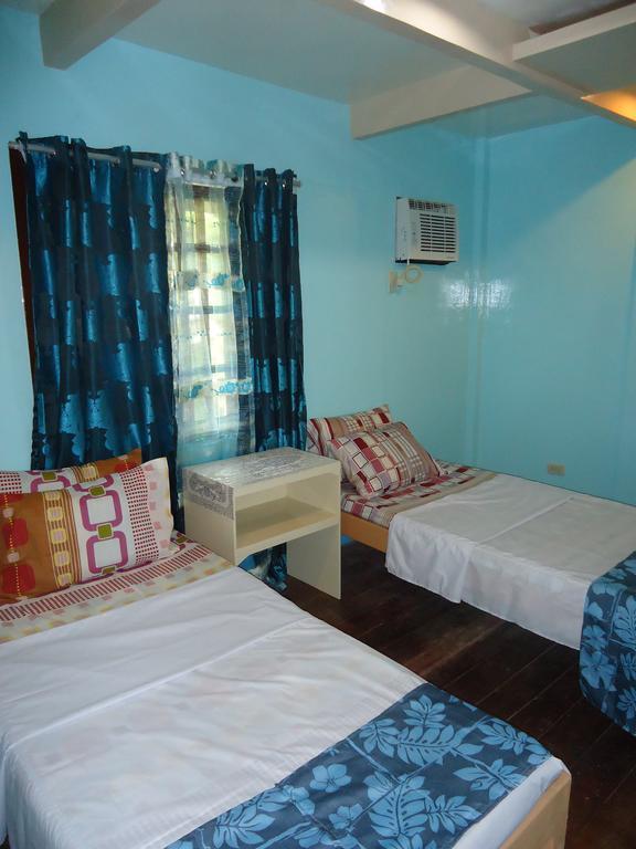 Villa Travelista Travel Lodge Puerto Princesa Rum bild